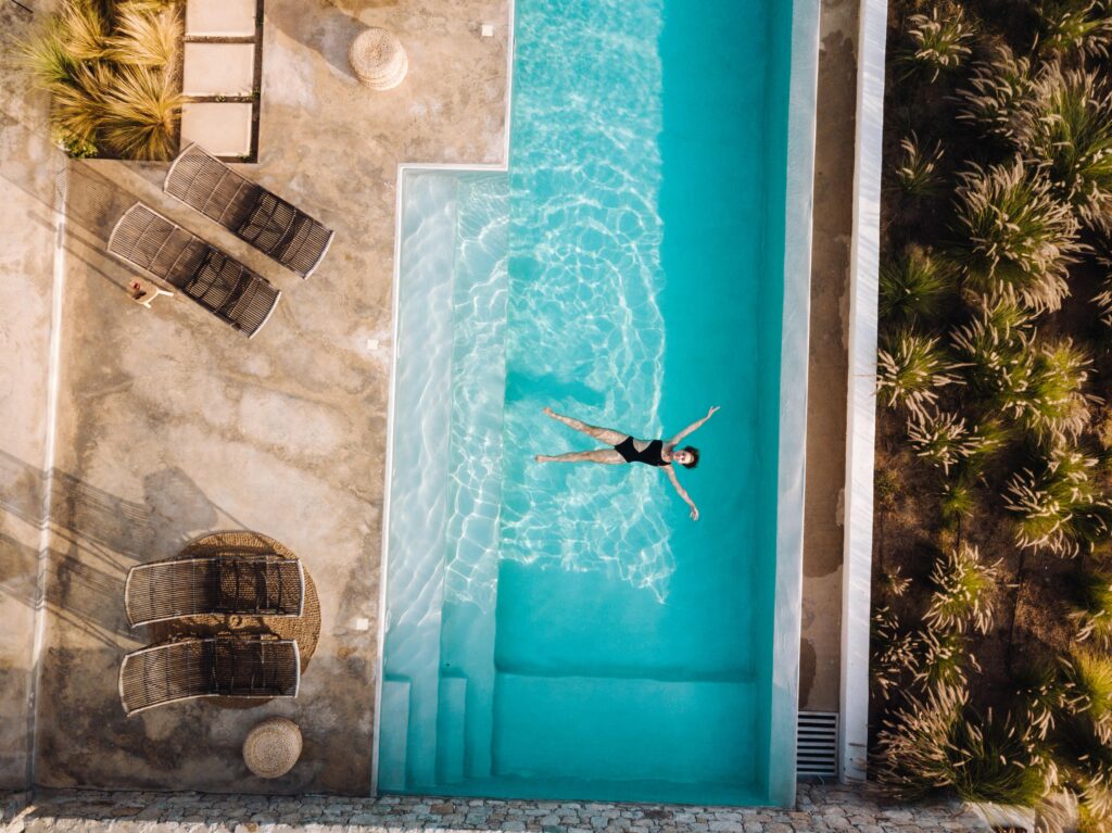 Stunning aerial shot of a woman relaxing in a luxurious infinity pool at a villa in Naxos, Greece. Mediterranean Way of Living.
Sol by Luna Mediterranean Wellbeing Philosophy
Rooted in slow & intentional living 
Intentional Living